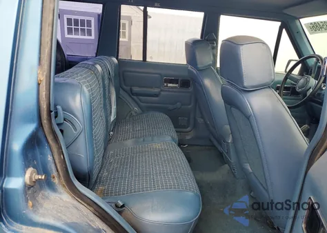 1987 Jeep Cherokee Pioneer из США, поврежденный, VIN 1JCML7823HT109343